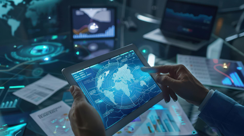 Person analysing global data on digital tablet.