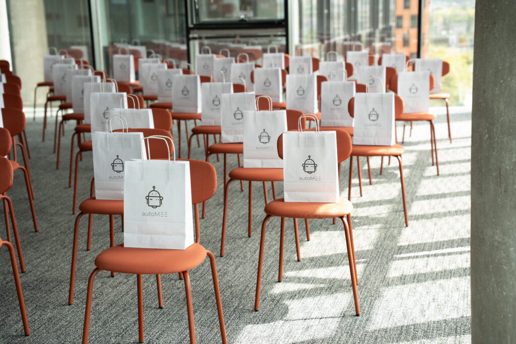 Conference chairs with branded goody bags.