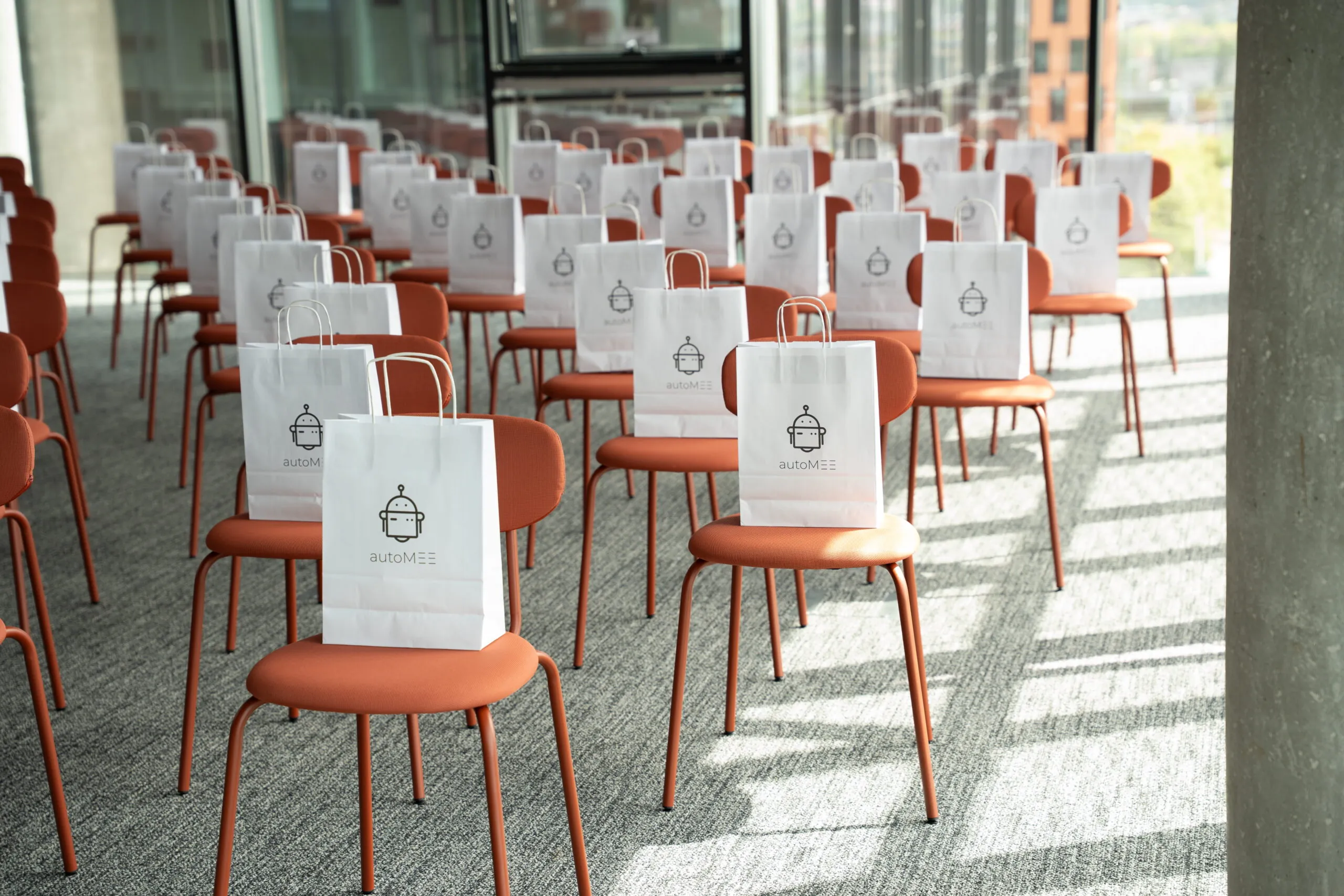 Conference chairs with branded goody bags.
